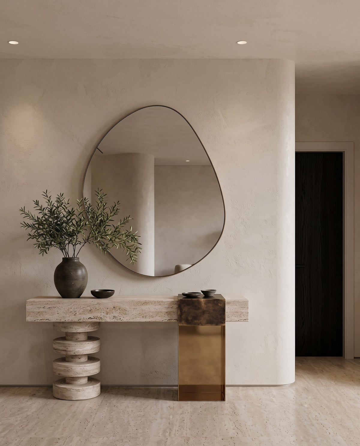 Stone console with an organic mirror