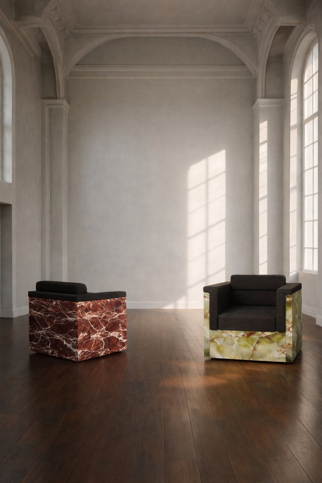 Two marble armchairs in a white room